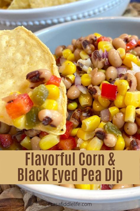 bowl of corn and black eyed pea dip with a tortilla chip Dip With Black Eyed Peas, Texas Cavalier Dip, Dips With Corn Chips, Black Eyed Pea Salsa Dips, Black Eye Pea Dip Recipe, Blackeye Pea Dip, Blackeyed Pea Dip, Black Eyed Peas Dip, Black Eye Pea Dip