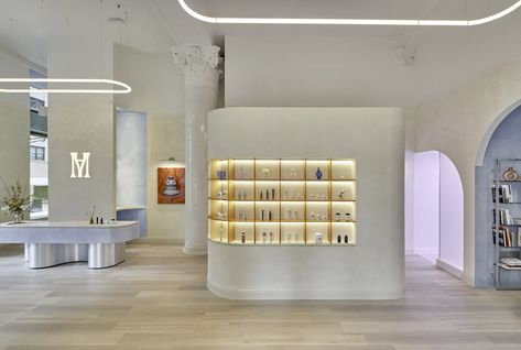 Modern Age Flagship in NYC by Madelynn Ringo | Yellowtrace Boston Interiors, Wellness Clinic, Good Readers, Modern Shelving, Terracotta Tiles, Curved Glass, Felt Material, City Design, Pocket Doors