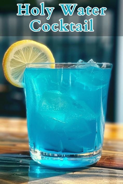 The Holy Water Cocktail is a refreshing and vibrant mixed drink that combines the smoothness of vodka and rum with the fruity flavors of blue curaçao, peach schnapps, lemonade, and a splash of pineapple juice. Peach Schnapps Drinks, Blue Alcoholic Drinks, Blue Curacao Drinks, Vodka Mixed Drinks, Most Popular Cocktails, Easy Enchiladas, 21 And Over, Popular Cocktails, Mixed Drinks Alcohol