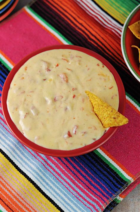 Queso Dip (without Velveeta): the BEST Queso - Sula and Spice Queso Dip Without Velveeta, Cream Cheese Queso, Easy Dinner Recipes For Family, Striped Tablecloth, Cheese Queso, Queso Recipe, Dinner Recipes For Family, Queso Dip, Famous Recipe