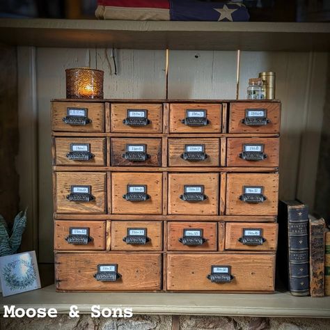 §: Primitive Apothecary Antique Pine Cabinet with Cast Iron Haberdashery Pulls This item is a refurbished primitive cabinet that is made of antique pine and has been given cast iron drawer pulls for all 18 drawers. There were a few drawers that were replaced and the original brown paint was replaced with a dark stain. This cabinet is very old and delicate but has a lot of life to live and great character for home decor or addition to a personal office. Dimensions: 21Hx 24Wx 8¼D Message me ... Primitive Cabinet, Pine Cabinet, Iron Drawer Pulls, Personal Office, Primitive Cabinets, Office Dimensions, Pine Cabinets, Dark Stain, Brown Paint