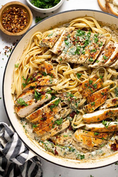 Creamy Tuscan Chicken Alfredo | This creamy Tuscan chicken is the picture of perfection! Sun dried tomato and Parmesan cream sauce along with juicy herb seasoned chicken breasts, nestled into a bed of al dente fettuccine noodles. Blackened Chicken Alfredo, Creamy Tuscan Chicken, Recipe Inspirations, Chicken And Pasta, Italian Meals, Tuscan Chicken Pasta, Bday Dinner, Fettuccine Noodles, Chicken Fettuccine