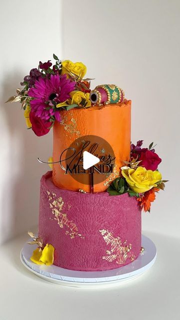 Sweet Cravings on Instagram: "Mehndi vibes 🧡🧡  . . 6 and 9 inch Victoria sponge cake . . Food colouring @colour.mill  Cake topper @cloudsandsprinkles  Stencil @caking_it_up  Edible gold leaf @sprinks_baking Dried gold ruscus @bakeboxboutique  Fondant @renshawbaking . . #sweetcravingsforever #mehndi #mehndicake #mehndinight #mehndiparty #mehndiceremony #mehndivibes #reeltrending #weddingcake #weddingcakes #weddingcakesideas #weddinginspiration #weddingideas #weddingvibes #cake #cakedecorating #cakesofinstagram #cakestyle #cakeideas #cakeart #cakeinspo #cakeinspiration #mehndireels #cakereels #pinkandorange #mehndikiraat #artofbaking #reel #reels #reelsinstagram" Mehendi Cake Designs, Mehandi Cake, Dholki Cake, Mehndi Cake, Mehndi Party, Edible Gold Leaf, Mehndi Night, Victoria Sponge Cake, Mehndi Ceremony