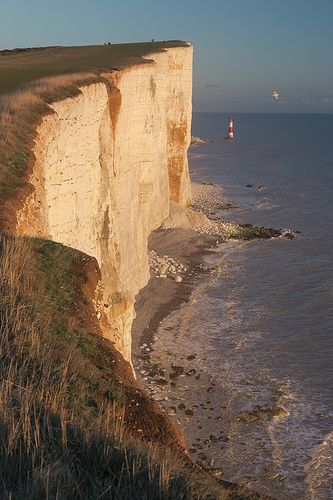 Beachy Head Lighthouse near Eastbourne in Sussex Beachy Head, The Seven Sisters, Southern England, Sussex England, Seven Sisters, Earth Pictures, Quaint Village, Boat Painting, England And Scotland