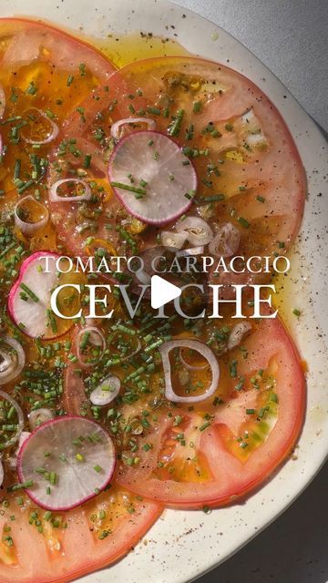 Jenny Bolle on Instagram: "I had this Tomato Carpaccio Ceviche something at a restaurant the other day and I can’t stop thinking about it🕺 let’s try to recreate it!   Ingredients: 1 big tomato  Sauce:  2 tbsp extra virgin olive oil Juice of 1 lemon Juice of 0.25 orange 1 tbsp orange zest  2 tbsp caper juice 1 tbsp sesame oil 1 tbsp soy sauce 2 tbsp Finley chopped capers  Topping: Salt/pepper 1 tbsp Chives Thinly slices Radishes Thinly slices shallots  Instructions: 1. Start by slicing your tomato into thin slices. 2. Make the sauce by mixing all the ingredients in a small bowl.  3. Layer the tomato slices on a plate. Drizzle with salt and pepper. 4. Pour the sauce over the tomatoes. 5. Top with finley chopped chives, radishes and shallots. Enjoy!" Tomato Carpaccio, Big Tomato, Fresh Salsa, Orange Zest, Radishes, Small Bowl, Stop Thinking, Sesame Oil, Shallots