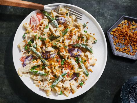 This Vegan Pasta Primavera recipe gets its flavor from macadamia nut milk and fresh spring vegetables. Get the recipe at Food  Wine. Vegan Pasta Primavera, Creamy Pasta Primavera, Creamy Vegan Pasta, Pasta Primavera Recipe, Spring Pasta, Creamy Mustard Sauce, Comfort Dinner, Creamy Pasta Recipes, Boiling Pasta