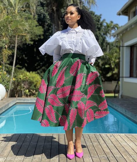 Tumi Links In Beautiful African Print Flared Skirt, White Shirt and Fuchsia Shoes - Clipkulture | Clipkulture Ankara Asoebi, Ankara Skirt Styles, Trendy Ankara Styles, African Fabric Dress, African Print Skirt, Ankara Gowns, Ankara Gown Styles, Afrikaanse Mode, Ankara Skirt