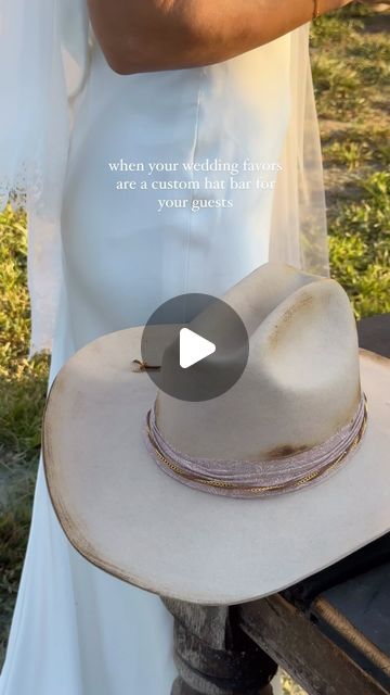 BTS Bride | Behind The Scenes Wedding Content Creators on Instagram: "When your wedding favors include a custom cowboy hat bar, your guests get a unique and personalized experience they’ll never forget from your special day🤠 

This was such a fun and stylish keepsake that added a special touch to Hayley + Austin’s wedding celebration in Tennessee!

Venue | @southalltn 
Couple | @austin_halliday @hayleymhalliday 
Design + Coordination | @kelseyraedesigns 
BTS Content Creator | Sydney for @thebtsbride 
Florals | @the_florista_ 
Photographer | @rickybailliephotography 
Custom Hats | @americanpainthat 
Rentals | @westerarentals @southerneventsonline" Custom Cowboy Hats, Wedding Content, Hat Bar, Wedding Celebration, Content Creators, Custom Hats, Cowboy Hat, Never Forget, Celebrity Weddings