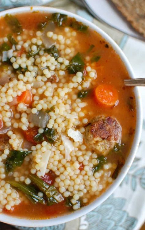 This easy to make Italian Wedding Soup recipe is full of the simple, delicious flavors of healthy greens, vegetables and turkey meatballs in a light broth. If you are looking for comfort food that is lighter and healthier, this is for you! // A Cedar Spoon #soup #Italianweddingsoup #meatballs #turkey #groundturkey #tomatoes #carrots #escarole #chickebroth #recipe #healthyrecipe #easyrecipe #breadcrumbs #parmesancheese #cheese #dicedtomatoes #pasta #acinidepepe #garlic #oregano #lunch #dinner Meatballs Turkey, Wedding Soup Recipe, Soup Italian, Greens Vegetables, Italian Wedding Soup Recipe, Healthy Greens, Healthy Italian, Wedding Soup, Healthy Turkey