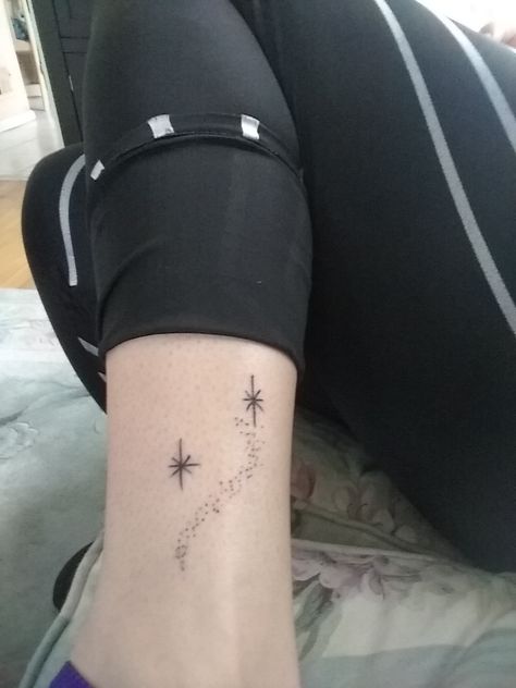 Second star to the right , pixie dust, ankle/leg, Peter Pan Pixie Dust Tattoo Ideas, Tattoo Second Star To The Right, The Second Star To The Right Tattoo, Subtle Peter Pan Tattoo, Neverland Stars Tattoo, Pixie Dust Tattoo Stars, Peter Pan Tattoo Star, Peter Pan Compass Tattoo, Fairy Dust Tattoo Stars