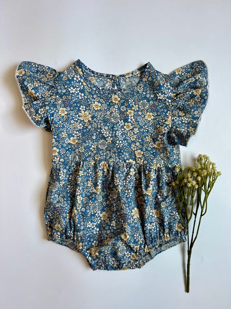 Indulge in timeless elegance with our Franny Vintage Floral Romper. The vintage floral pattern adds a touch of sophistication to this delicate piece, perfect for any occasion. Experience the beauty of vintage-inspired fashion with this exclusive romper. 95% Cotton 5% Polyester Machine wash cold with like colors, hang or lay flat to dry for best results. Fit is true to size. Tag is sewn to outside of item to prevent irritation to babes skin. Tags can be easily removed by pulling back the fabric a Spring Baby Outfits, Summer Newborn Outfits, Cute Baby Outfits, Vintage Baby Outfits, Aesthetic Baby Clothes, Cottagecore Baby Outfits, Cottagecore Baby Clothes, Cottage Core Baby Clothes, Baby Girl Floral Romper