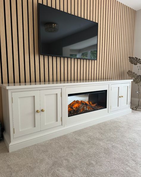 DELIVERED TODAY………🚚😍 Our 2.4m Shaker Beaded TV Stand with Intergrated British Fire in F&B Skimming stone 🪵🔥 ☑️ Fires are pre built into our cabinets for simple plug in operation ( no fitting required ) ☑️ Luxury real life log upgrade comes as standard ☑️ Award winning British fires new forest range are most true to life on the market and come with AR glass ☑️ Custom size units available ☑️ Choose the paint, top and handles to your preference ☑️ 1500W heat output using air curtain techno... Skimming Stone, New Forest, Tv Stand, Custom Sizing, Award Winning, Real Life, Bespoke, Bedroom Decor, Handles