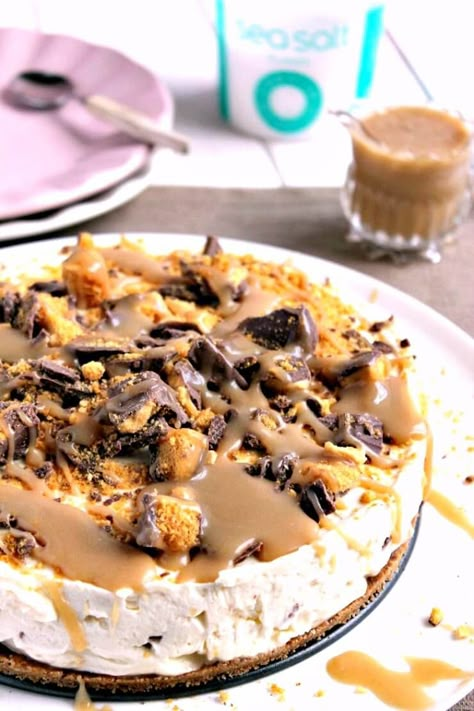 For the Base: 250g Chocolate Digestives, crushed into fine crumbs with a rolling pin 90g Butter, melted For the Cheesecake: 600g Full Fat Cream Cheese 150g Icing Sugar, sifted 1 TSP Vanilla Extract 200ml Double Cream 2 Cadbury Crunchie Bars, crushed For the Salted Caramel Sauce: 175g Light Brown Sugar 50g Butter 300ml Double Cream 1/2 TSP Sea Salt For the Topping: 2 Cadbury Crunchie Bars, crushed Crunchie Cheesecake, Chocolate Honeycomb, Cadbury Crunchie, Fancy Deserts, Recipes Cheesecake, Salted Caramel Cheesecake, Cheesecake Lovers, Double Cream, Caramel Cheesecake