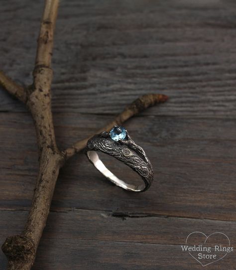 Tree bark topaz engagement ring, Branch silver wedding band, Birthstone ring, Unusual womens engagement ring, Unique gift for her ■ All my rings are only crafted with the finest of recycled metals DETAILS: Central Stone - 5mm Natural Topaz, weight approx. 0.66ct. Metal - Sterling Silver Dimensions - width 9mm (0.35 in.), band width - 2mm (0.078 in.) Finish - shiny and oxidize (shiny at your request) Please choose your ring size and gems in menu while making your order View all tree bands and rin Sterling Silver Solitaire Topaz Wedding Ring, Blue Topaz Tension Setting Wedding Jewelry, Handmade Blue Topaz Wedding Jewelry, Unique Sterling Silver Topaz Ring For Wedding, Handmade Blue Topaz Jewelry For Wedding, Heirloom Sterling Silver Topaz Wedding Ring, Heirloom Sterling Silver Topaz Ring For Wedding, Silver Topaz Ring With Tension Setting For Wedding, Unique Sterling Silver Topaz Promise Ring