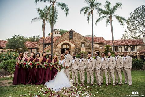 A Perfectly Dressed Bride and Groom Look Like... | Friar Tux Ivory And Burgundy Tuxedo, Beige Suit With Burgundy Tie, Groom Burgundy Suit Bridesmaid Dresses, Cabernet Groomsmen Attire, Champagne And Burgundy Wedding Groomsmen, Cabernet Bridesmaid Dresses With Groomsmen, Tan And Burgundy Groomsmen, Wine Bridesmaid Dress With Groomsmen, Burgundy And Tan Wedding Party