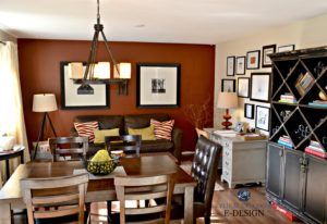 Benjamin Moore Tawny Rose feature accent wall,leather couch, artwork. Kylie M E-designs Orange Dining Room, Rust Wall, Rust Colour, Dark Wood Furniture, Cream Kitchen, Dining Room Paint, Revolving Door, Dining Room Remodel, Cabinet Color