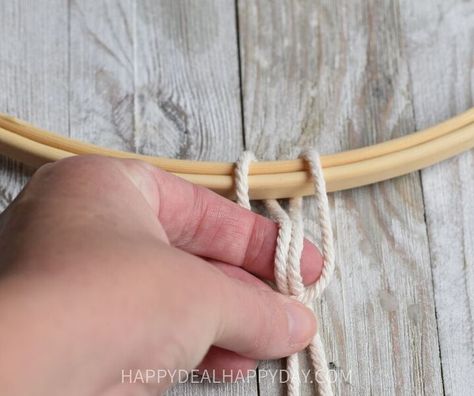 Today I'm going to show you how to make a diy hoop wreath (using an embroidery hoop) and show you how to combine a floral hoop wreath with a hoop wreath with yarn and macrame!I'm personally in love with combining farmhouse style decor with a splash of boho decor style with it! I'm super thrilled that macrame is back trending and all of my friendship bracelet making skills I learned as a kid are coming back as a crucial skill I need when incorporating macrame into boho wall decor!… Boho Decor Style, Friendship Bracelet Making, Yarn Tutorials, Floral Hoop Wreath, Boho Yarn, Yarn Hanging, Simple Macrame, Yarn Wall Hanging, Wire Wreath