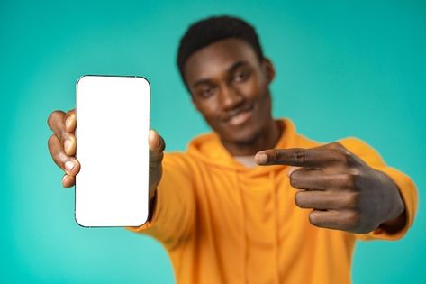 Holding Phone Pose, Person Holding Phone, Holding Phone Reference, Man Holding Phone, Smartphone Ads, Tailoring Logo Design Ideas, Holding Cellphone, Pose Man, Man Pointing