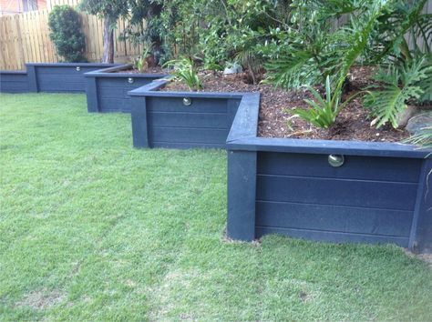 Painted retaining wall Diy Garden Edging, Garden Beds Diy, Good Neighbor Fence, Sleeper Retaining Wall, Wood Retaining Wall, Backyard Retaining Walls, Beds Diy, Garden Retaining Wall, Sloped Backyard