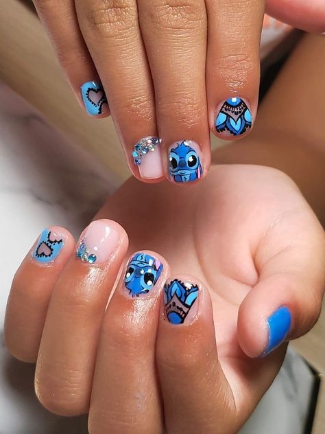 Unleash your personality with our Nail Art Extravaganza, featuring your favorite cartoons, movies, and snacks. From nostalgic animations to blockbuster hits and tasty treats, our collection offers creative and playful designs to adorn your nails. Perfect for movie nights or just to bring some fun into your daily look. #NailArtIdeas #CartoonNails #MovieNailDesigns #SnackNailArt Stitch Nails Short Easy, Stitch Birthday Nails, Lilo And Stitch Nails For Kids, Stitch Nail Designs Short, Stitch Gel Nails, Easy Stitch Nails, Short Stitch Nails, Gel Nails Disney, Stitch Nails For Kids