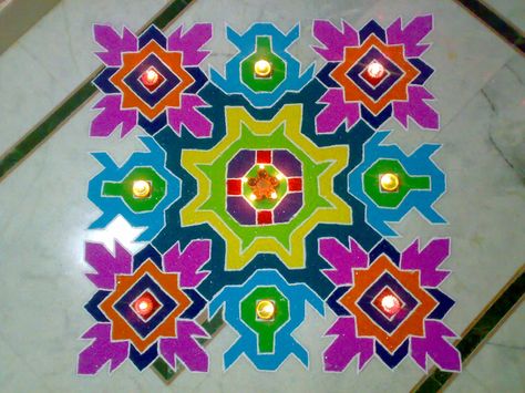 Diwali Rangoli Unique Design, Doted Rangoli Designs With Color, Diwali Rangoli Designs Simple, Thipkyanchi Rangoli, Rangoli Designs Latest Unique, Unique Poster Design, Door Rangoli, Colour Kolam, Simple Mandala Design