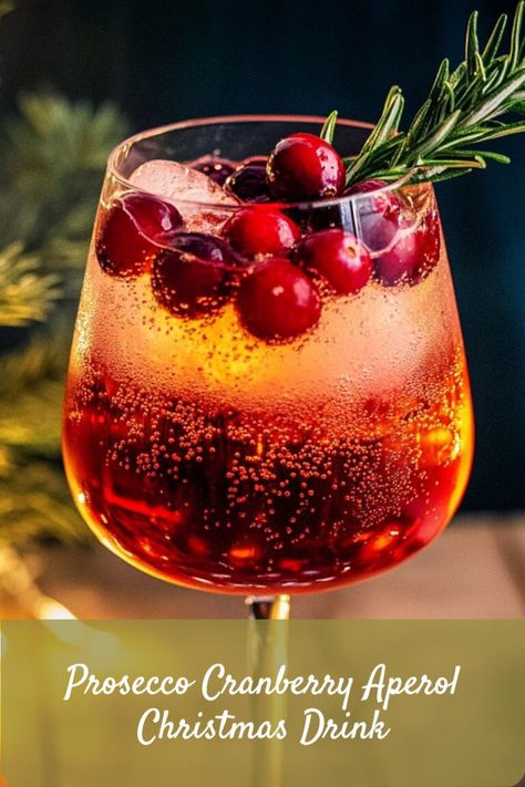 An Italian-inspired cocktail with tangy cranberry, Aperol, and prosecco, perfect for Christmas. Cranberry Holiday Cocktail, Winter Aperol Spritz, Christmas Prosecco, Aperol Drinks, Prosecco Punch, Prosecco Cocktail Recipes, Prosecco Drinks, Festive Holiday Cocktails, Cranberry Drinks