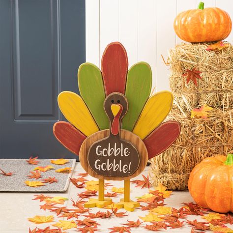 PRICES MAY VARY. SIZE: 18.43"L x4.8"W x24.33"H. Could go into the ground or even be put into a planter on the porch. Use it to greet your visitors during the upcoming holiday. HANDCRAFTED: This turkey Table Decor is made of sturdy Wooden which is Solid wood turkey with colorful wings, ideal for both indoor and outdoor use. FALL & THANKSGIVING DECOR: It features festive fall colors such as orange, yellow and dark red which will surely enrich you lawn or garden.simple assembly is required. RUSTIC Wood Turkey, Painted Turkey, Thanksgiving Inflatables, Thanksgiving Wood Crafts, Wooden Turkey, Turkey Table, Colorful Wings, Diy Turkey, Fall Harvest Decorations