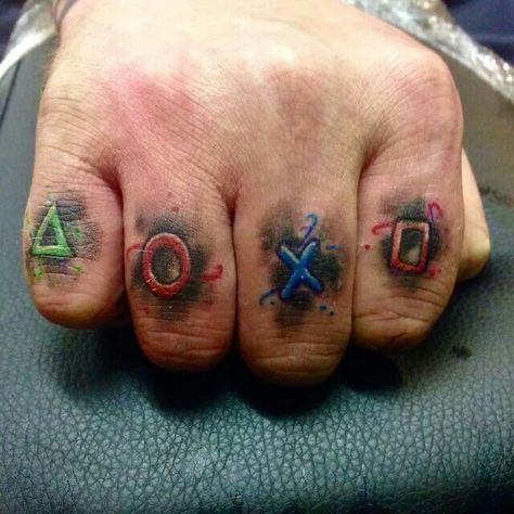 Video Game Hand Tattoo, Hand Tattoos Pictures, Playstation Tattoo, Fist Tattoo, Button Tattoo, Egyptian Eye Tattoos, Gamer Tattoos, Finger Tattoo Designs, Knuckle Tattoos