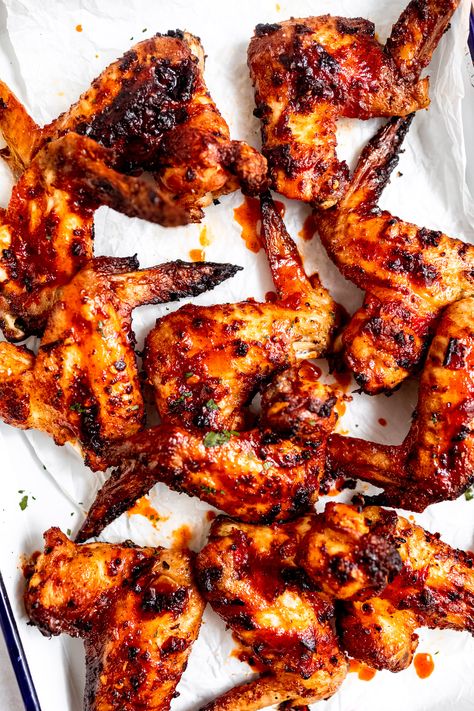 Nando's copycat peri peri chicken wings are the perfect BBQ appetizer. A simple chicken wing marinade with smoky paprika, spicy chillies and some sweet honey come together in just a few minutes. These peri peri wings get crispy skin and they can be baked or grilled! Peri Peri Wings Recipe, Peri Peri Wings, Peri Peri Chicken Wings, Peri Peri Chicken Wings Recipe, Chicken Wings Marinade, Chicken Wings Grilled, Wings Marinade, Chicken Wings Bbq, Wing Marinade