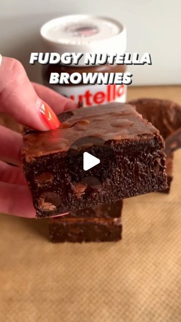 food enjoyers on Instagram: "FUDGY NUTELLA BROWNIES😋😍

These are the thickest, richest, and fudgiest brownies I've ever made and they're one of my absolute favourites!🤤

Sound on for full instructions🔊

All you need is:
170g unsalted butter, melted & cooled slightly
250g caster sugar
3 large eggs
250g dark chocolate, melted & cooled slightly
150g Nutella
100g plain flour
30g cocoa powder
1 tsp salt
150g chocolate chips
Tin size: 8x8"

Bake until the edges are cracked and the middle no longer wobbles - cooking times are a guide
Allow to cool fully in the tin and refrigerate for at least 3 hours or overnight for the best fudgy texture! It's worth it I promise

Enjoy!❤️

by @fitwafflekitchen
#brownielover #brownierecipe #brownieslovers
#bakingtherapy #bakingaddiction #fudgybrownies 
#easy Easy Nutella Brownies, Nutella Brownies, Brownie Cupcakes, Fudgy Brownies, Caster Sugar, Plain Flour, Brownie Recipes, Chocolate Chips, Unsalted Butter