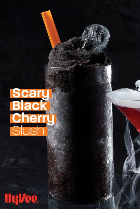 This scary cherry drink is actually non-alcoholic. To get the dark look, we used activated charcoal water from the HealthMarket and frozen dark cherries. Find everything you need for your Halloween fun at your local Hy-Vee, or shop online at Hy-Vee.com. Halloween Frozen Drinks Alcohol, Frozen Halloween Drinks, Black Punch Recipe Non Alcoholic, Gothic Alcoholic Drinks, Black Drinks Non Alcoholic, Halloween Mocktails Non Alcoholic, Halloween Drinks Nonalcoholic, Halloween Beverages, Dark Drinks