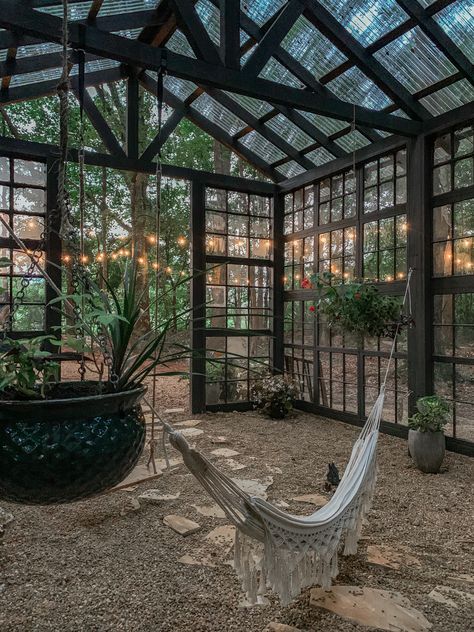 Greenhouse Over House, Patio Door Greenhouse, Greenhouse Sitting Area, Goth Greenhouse, Northern Greenhouse, Moody Greenhouse, Small Greenhouse Interiors, Forest Greenhouse, Unique Greenhouse