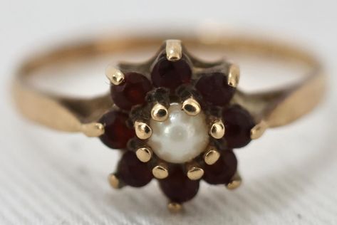 A 9k solid gold split pearl and garnet cluster ring. It weighs 1.2g and is a size 4 3/4. It has hallmarks for Birmingham 1994. It is in good condition. Price: $200AUD Cluster Ring, Birmingham, Garnet, Solid Gold, Split, Size 4, Ring, Gold, Quick Saves