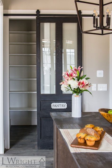 A Day in the Life of a Designer for a Custom Home Builder Kitchen Pantry Doors, Barn Door Pantry, Beautiful Pantry, Dream Pantry, Glass Pantry Door, Custom Pantry, Glass Barn Doors, Pantry Door, Pantry Design