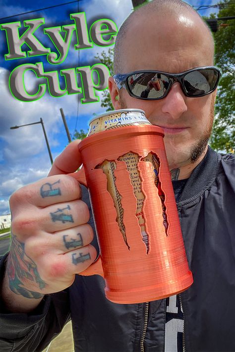 Featured is the Kyle Cup aka the Chad Chalice or the Stimulant Stein.  This is a 3D Printing Project for a Monster Energy Drink can in the fashion of a classic Beer Stein.  This Can Koozie features the Monster Energy drink logo on the side and a 3D Printed handle for easy holding of your beverage.  This is a fun 3D Print Project just to enjoy as a silly Maker Project.  Enjoy your 16oz Monster Energy Drink today with this FREE Download design on Thangs.com for your 3D Printing! 3d Resin Printer Projects, 3d Printer Projects Free, 3d Printer Ideas, Monster Energy Drink, 3d Printing Diy, Maker Project, 3d Printer Projects, 3d Printer Diy, 3d Printing Projects