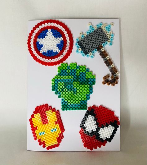 *all cards can be made with or without a greeting on the front and inside.  *any design can be created - we love making your unique designs! *this design only available in A5 and comes with envelope, they can also be made on various coloured cards. *made to order. *different interchangeable greetings in product photos. Avengers Perler Beads, Superman Crafts, Avengers Perler, Perler Bead Designs, Art Perle, Plastic Canvas Christmas, Melting Beads, Perler Beads Designs, Perler Bead Art