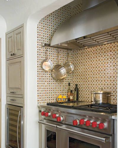 Vibrant mosaic tile in the cooking alcove spices up the stove area. Stove Alcove, Ikea Galley Kitchen, 1960s Kitchen Remodel, Colonial Kitchen Remodel, Tiny Kitchen Remodel, Vintage Kitchen Remodel, Kitchen Remodel Pictures, Simple Kitchen Remodel, Galley Kitchen Remodel