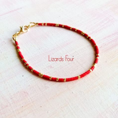 NEW!!! Red Miyuki Bracelet! LizardsFour.etsy.com We Ship worldwide!  #etsy #etsyshop #giftforher #giftforwomen #jewelryaddict #jewelryoftheday #giftideas #etsyseller #jewellery #bracelets #redjewelry #etsysellers #stylemepreety #jewelry #minimalisticbracelets #instajewelry #jewelrymaking #daintybracelets #etsyfinds #bracelet #beadedbracelets #beadesbracelet #madeingreece #smallshop #fashionjewelry #smallbusiness #onsale #prosfores #instafashion #redbracelets Minimalistic Bracelet, Simple Beaded Bracelets, Small Bead Bracelet, Spiral Jewelry, Miyuki Bead, Red Beaded Bracelet, Gold Beaded Bracelet, Plain Red, Spiral Necklace