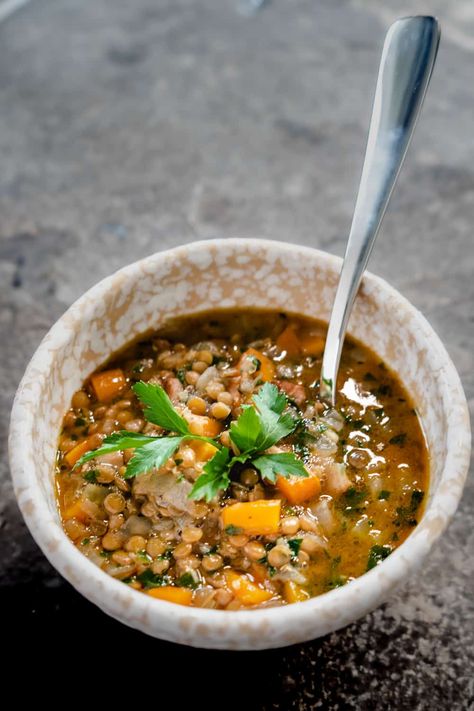 This fast and easy Smokey Lentil And Bacon Soup is as cozy as your favorite winter sweater. Omit the bacon and use vegetable stock to easily make it vegetarian or vegan! #lentilsoup #lentilbaconsoup My Pocket Kitchen, Slow Cooker Vegetable Soup, Lentil And Bacon Soup, Pocket Kitchen, Canned Lentils, Vegan Slow Cooker, French Lentils, Bacon Soup, Dried Lentils