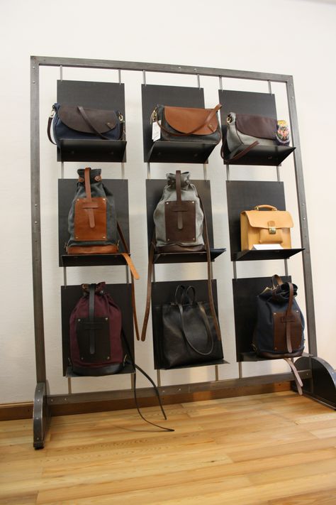 exposition!! iron structure with backpacks and bags!!Cremona Italy Bag Store Display, Cremona Italy, Backpack Store, Handbag Display, Craft Booth Displays, Red Wines, Interior Display, Bag Display, Shop Front Design