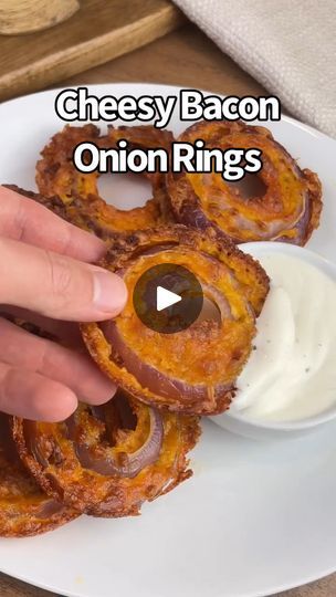 10K views · 137 reactions | Cheesy Bacon Onion Rings 🤤🙌 Full Recipes In Caption 👇

Revitalize your keto journey with our print-ready e-book featuring 300+ delicious recipes. Elevate your health and taste experience today! 🌟📚 https://cutt.ly/JwZa1idO  The Keto Recipes 

Ingredients:
Shredded cheddar
Sliced onions
Bacon bits

Instructions:
1. Combine all ingredients into a greased donut pan adding shredded cheddar first.
2. Bake for 20 minutes.
3. Take out, let cool until they harden & enjoy!

This is such an easy low carb recipe when you’re craving something crunchy / salty but still want to keep it keto 👍

Pro tip: These would also be super yummy in a muffin tin! They just won’t have holes in the middle.

Credit:- @ketosnackz

#recipereel #ketorecipe #lowcarbhighfat #ketodiet #lowcar Baked Onions In Muffin Tin, Cheesy Bacon Onion Rings, Bacon Onion Rings, Bacon Recipes Appetizers, Onion Rings Recipe, Donut Pan, Baked Onions, Bacon Appetizers, Keto Journey