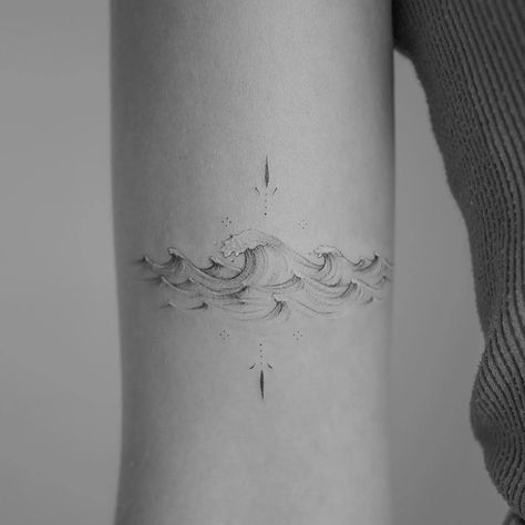 12 Best Waves Tattoo Designs | Unleash Your Inner Ocean Simple Ocean Tattoo, Mh Tattoo, Eli Tattoo, Simple Wave Tattoo, Tattoo Ideas Simple, Small Wave Tattoo, Wave Tattoo Design, Inner Arm Tattoos, Wave Tattoo