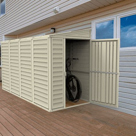 The 4' x 10' Sidemate is designed to lean up against the side of your home. The generous 10' depth gives you a large 175 cubic feet of storage space in a narrow side corridor of your home. The SideMate 4x10 vinyl shed is an easy-to-assemble outdoor storage solution designed to be placed on the side of your home. The contemporary design beautifies any backyard while maximizing storage space for yard tools or garden equipment. Constructed of durable all weather vinyl in a neutral ivory color, the SideMate vinyl shed is maintenance free. It will never need painting or treating. It will not rust, dent, rot, mildew or fade. It is also fire retardant and much quieter in the rain than metal storage sheds. The wall columns are reinforced with a solid metal structure, giving the vinyl shed a lot of Outside Sheds, Plastic Storage Sheds, Resin Sheds, Vinyl Sheds, Carport Sheds, Outdoor Storage Solutions, Shed Floor, Outdoor Storage Shed, Shed Organization