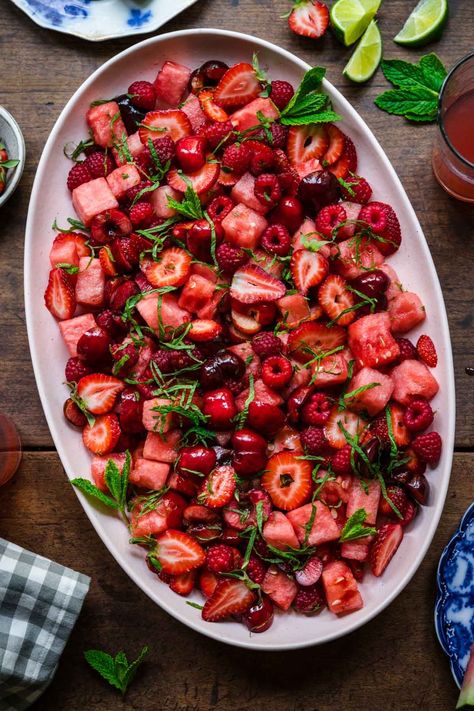 Tired of the usual fruit salad? Our summer Watermelon Fruit Salad with strawberries, raspberries, cherries and a lime mint dressing is a refreshing, flavorful spin on classic fruit salad. With fresh berries, juicy watermelon, and a tart dressing to tone down the sweetness, your guests will thank you at your next outdoor BBQ. Watermelon Cherry Salad, Green Salads With Fruit, Watermelon Fruit Salad, Berry Salad, Jello Salad, Strawberry Salad, Summer Watermelon, Brunch Party, Fresh Berries