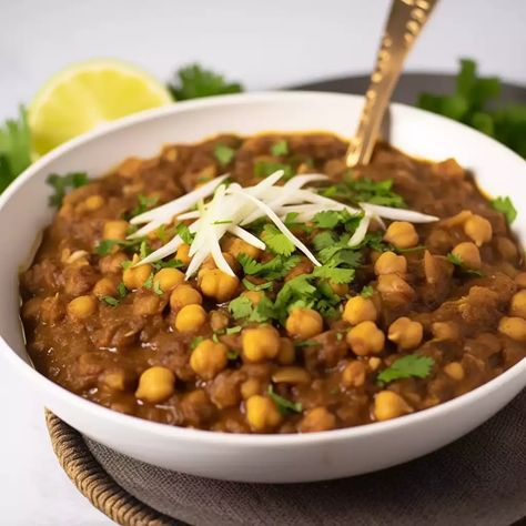 There’s more to chickpeas than hummus, and Chikar Chole is the glorious proof of that. Hailing from the North Indian kitchens, this robust chickpea curry has seeped into culinary traditions across the globe. Spices, the soul of Indian cuisine, are generously employed, but worry not; making this dish is far from complicated. A few simple steps […] The post Chikar Chole appeared first on Cook with Nabeela. Chole Recipe, Easy Supper Recipes, Pakistani Recipes, Chickpea Recipes, Chickpea Curry, Vegetable Curry, Pakistani Food, Indian Kitchen, Comfort Dishes