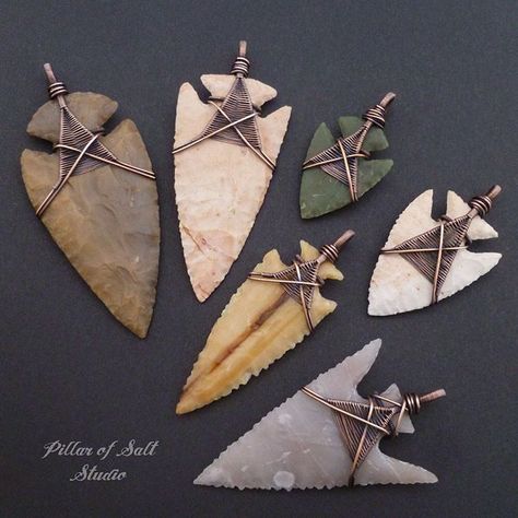 These arrowheads were sent to me by a customer to have wrapped into pendants. A fun collection of shapes and colors! #arrowhead #wirewrappedjewelry #pillarofsaltstudio Diy Arrowhead, Wire Wrapped Arrowhead, Arrowhead Jewelry, Arrowheads Jewelry, Wire Bending, Wrapped Stones, Arrow Heads, Arrow Head, Arrowhead Necklace