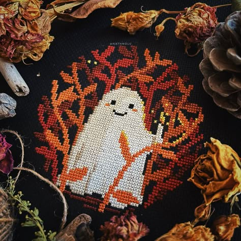 "Embrace the spooky season and Halloween with this cross stitch pattern -  fall cute ghost with a candle in the dark woods. It features a delightful yet eerie design that's perfect for adding a touch of witchy magic to your autumn decor. With an instant download option, you can start stitching right away. This pattern captures the essence of the dark forest, pagan, and gothic autumn themes. Beginner friendly This digital pattern is in PDF format for download (not a paper pattern).  No fabric, fl Ghost Cross Stitch, Gothic Autumn, Candle In The Dark, Halloween Cross Stitch Patterns, Halloween Cross Stitches, Cross Stitch Art, Dark Forest, Cute Ghost, Cross Stitch Designs