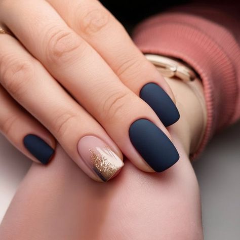 This manicure combines sophisticated matte navy nails with a single accent nail in a soft nude base topped with a gradient gold glitter. The matte texture contrasts beautifully with the glossy, shimmering accent, creating a modern and elegant look perfect for any occasion. Matte Navy Nails, Gold Accent Nails, Gold Accent Nail, Navy Nails, Red Acrylic Nails, Accent Nail, Simple Gel Nails, Matte Texture, Acrylic Gel