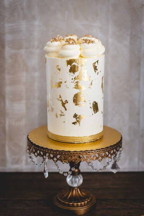 One Tier Buttercream Cake Gilded in Gold Leaf and Topped with Buttercream Swirls and Sprinkles Wedding Cake Gold Foil, Golden Birthday Cake Ideas, One Tier Wedding Cake, Gold Foil Cake, Wedding Cake Gold, Gold Cake Decorations, Gold And White Cake, Quilted Cake, Golden Birthday Cakes