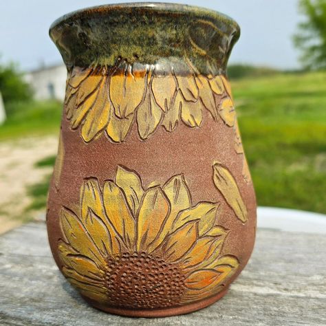 Sunshine and summertime 🌞 🌻 the perfect combination for your morning coffee, iced summer drink or evening tea 😍 🍵 #pottery #sunflower #flowerart #gardenfairies #farmlife #homesteading #handpainted #ceramics #carvedpottery Sunflower Lantern, Pottery Sunflower, Ceramic Sunflower, Tea Pottery, Hand Painted Pottery, Summer Drink, Evening Tea, Pottery Painting, Summer Drinks